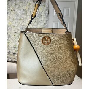 Gold bucket bag with matching pouch